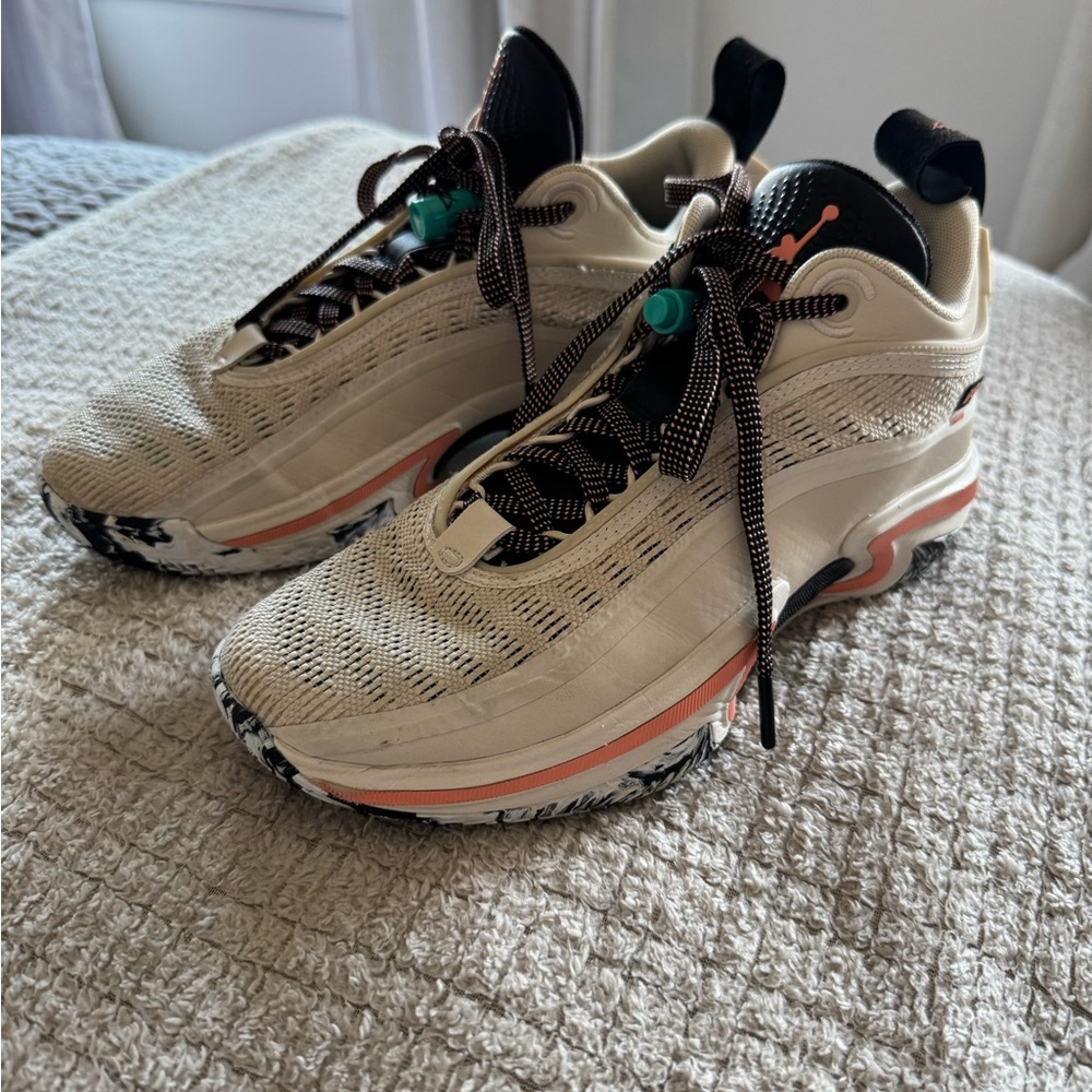 Jordan Cream and Black Athletic Shoes